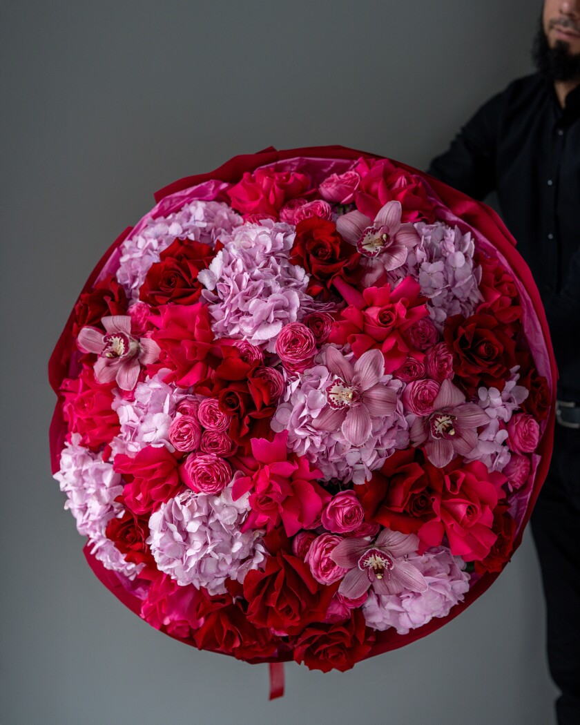 Mixed bouquet of blush hydrangeas and pink roses