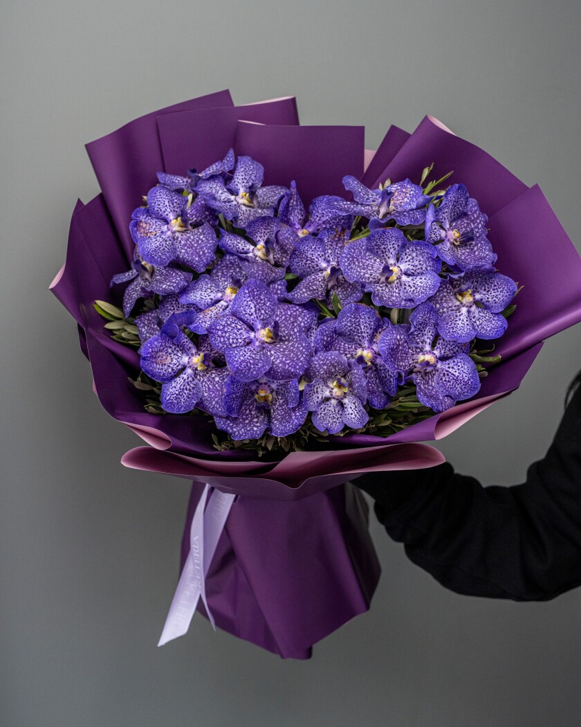 Mono bouquet of purple vanda orchids