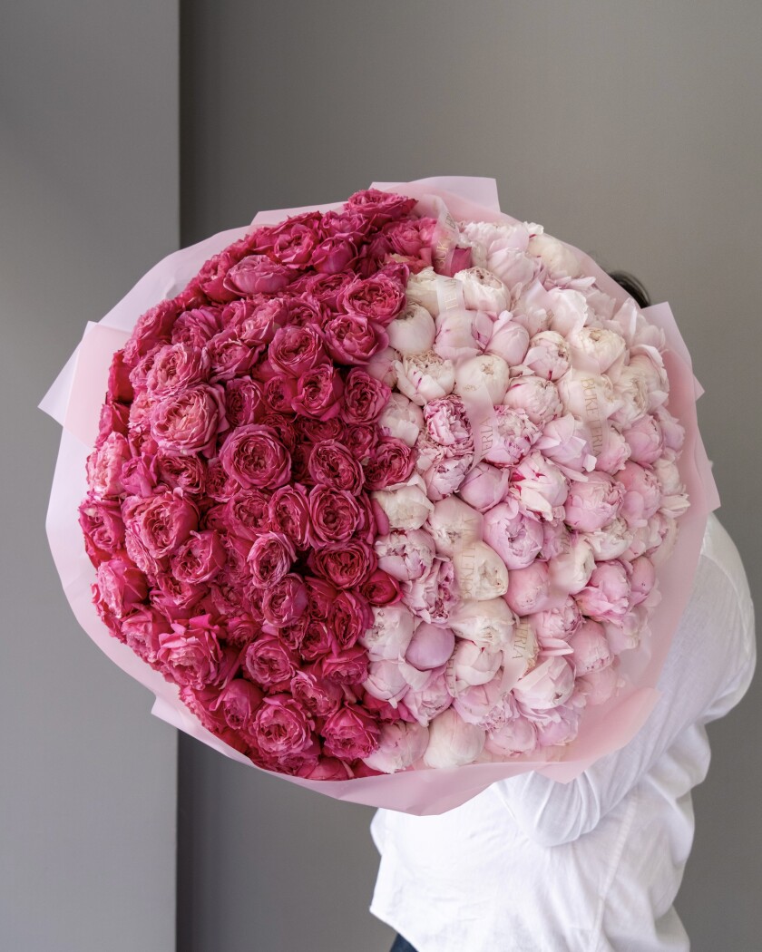 Blush peonies with hot pink spray roses