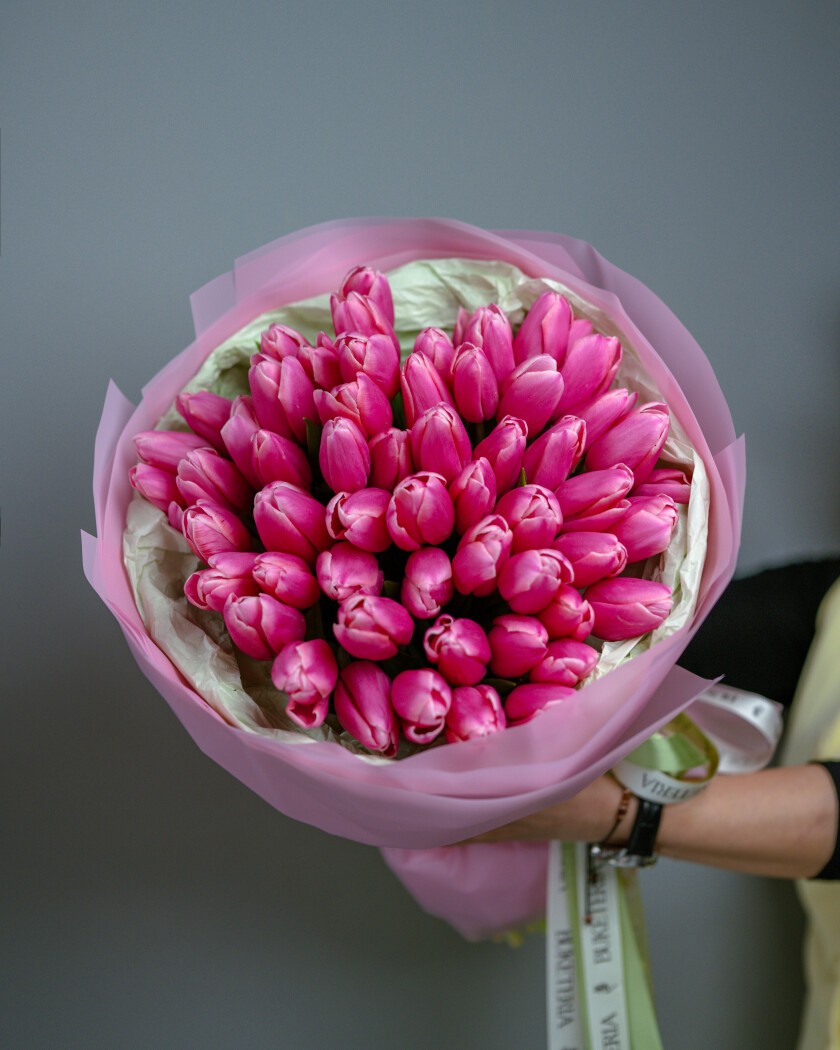 Fifty-three hot pink tulips in waterproof paper