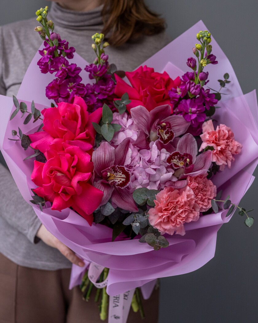 Mixed bouquet of hot pink garden roses and light pink hydrangeas