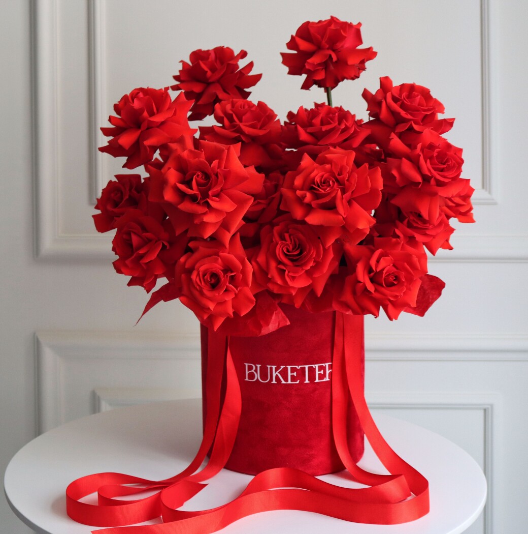 Twenty-seven red hybrid tea roses in a luxury box