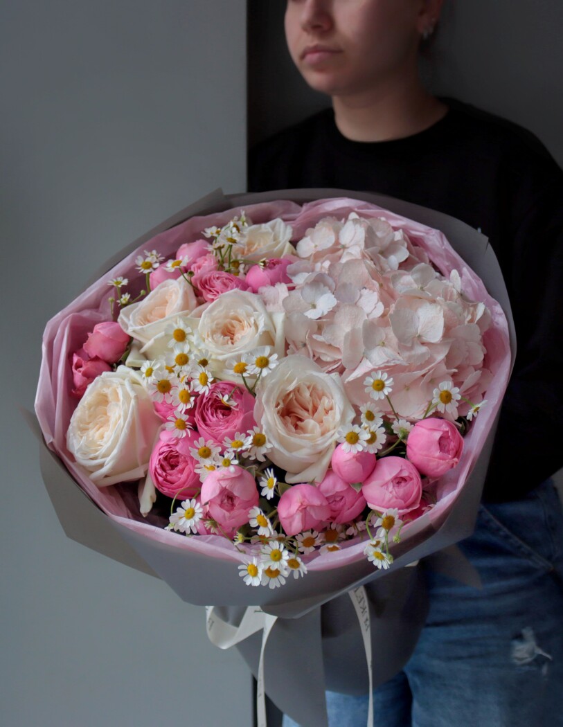 Five cream garden roses with hot pink spray roses and light pink hydrangea