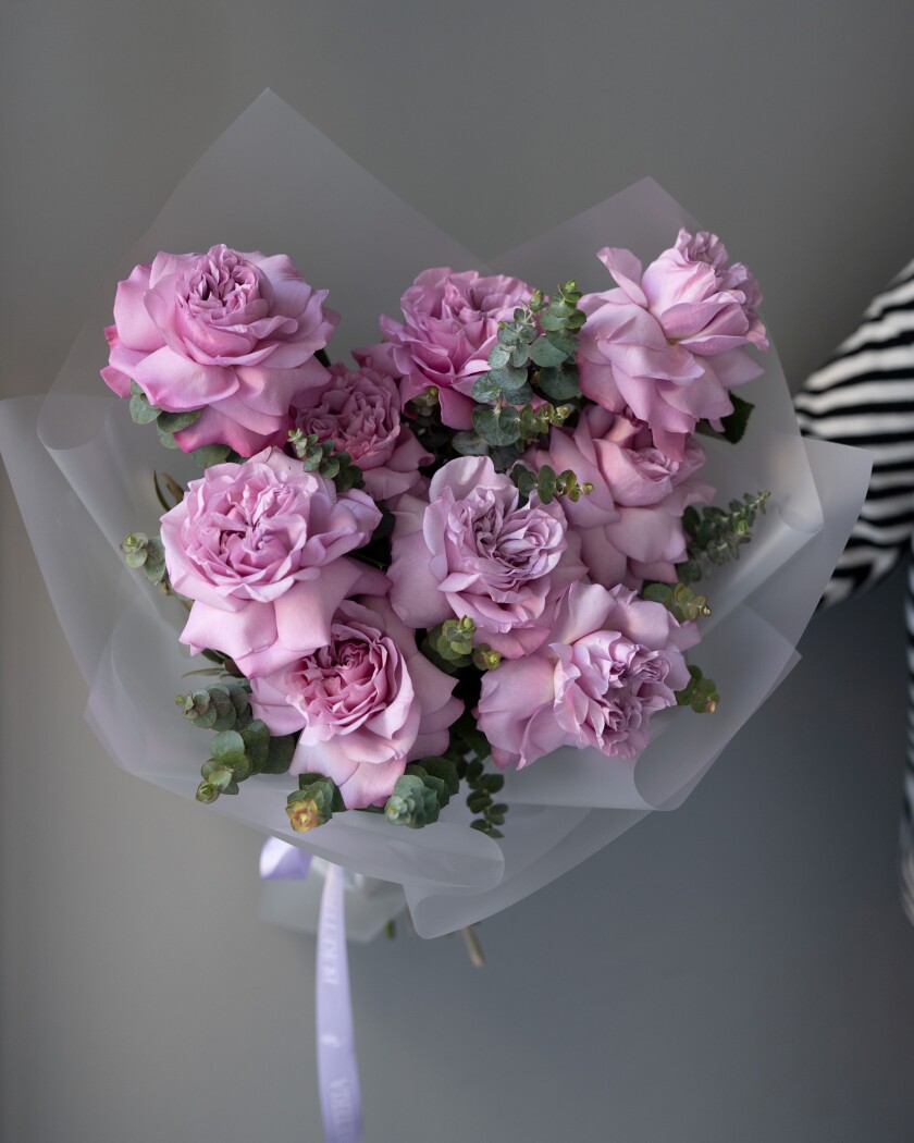 Nine lavender garden roses in waterproof paper