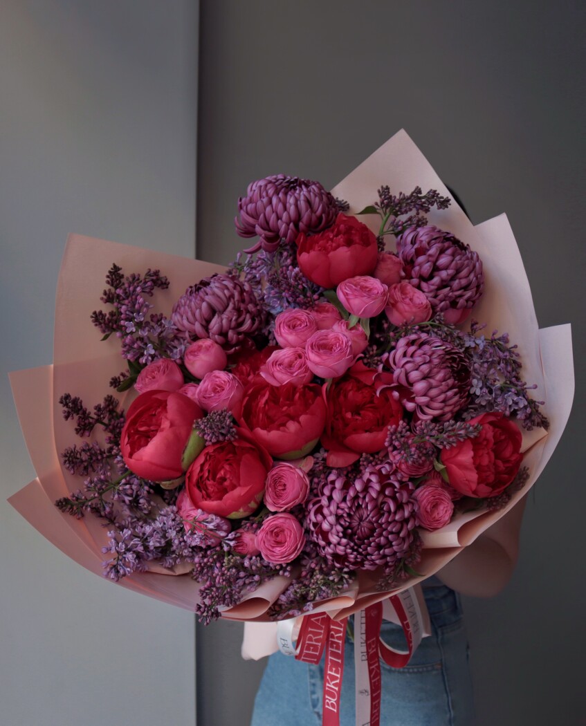 Six red peonies with hot pink spray roses