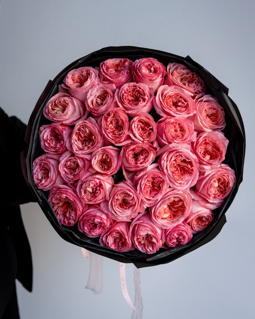 Mono bouquet of dusty pink garden roses