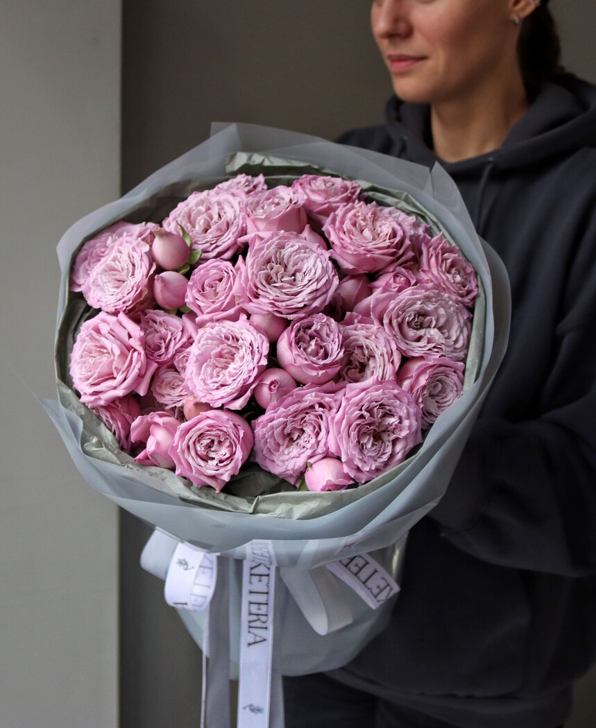 Nine dusty pink spray roses in waterproof paper