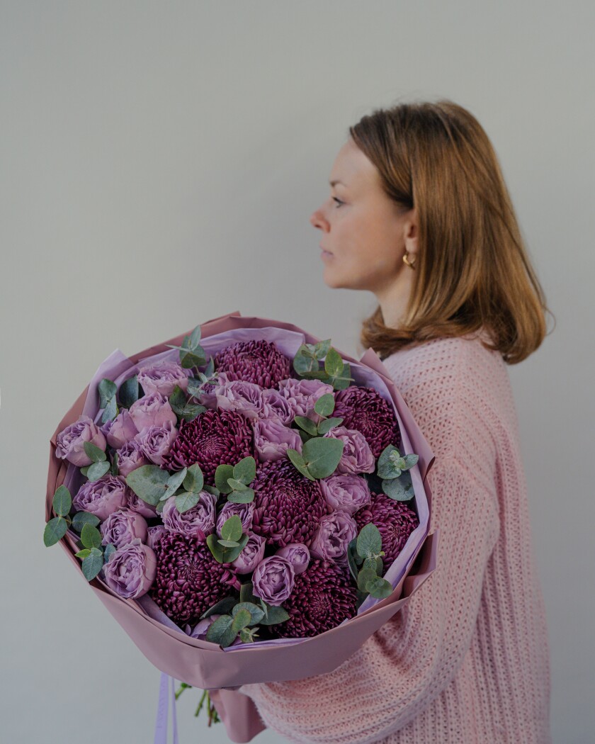 Purple chrysanthemums and lavender spray roses