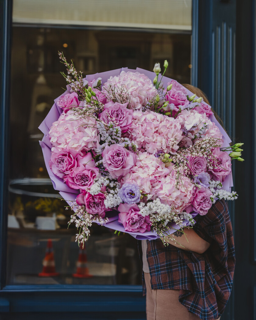 Blush hydrangeas with light pink garden roses and lavender lisianthus