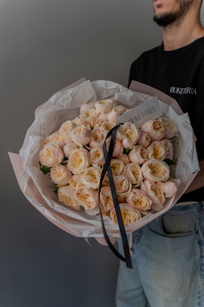 Peach spray roses in waterproof paper