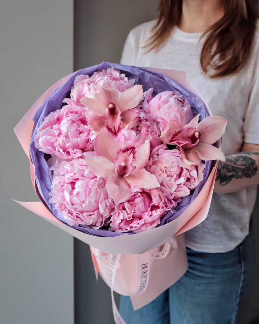 Seven pink peonies and three light pink cymbidium orchids