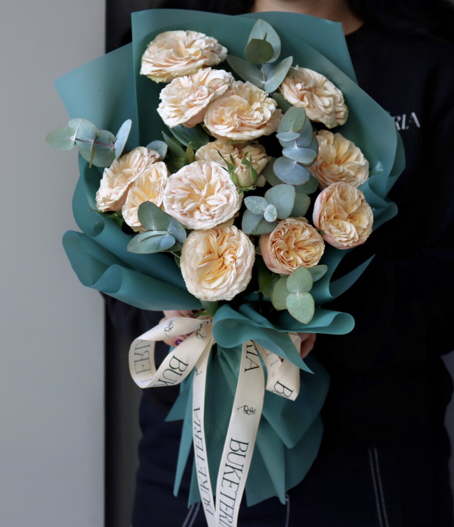 Peach spray roses in waterproof paper