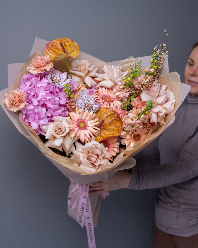 Mixed bouquet of light pink hydrangeas and peach gerberas