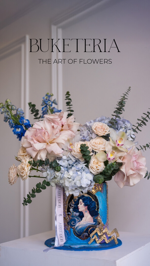 Decorative composition of light pink hydrangeas and cymbidium orchids