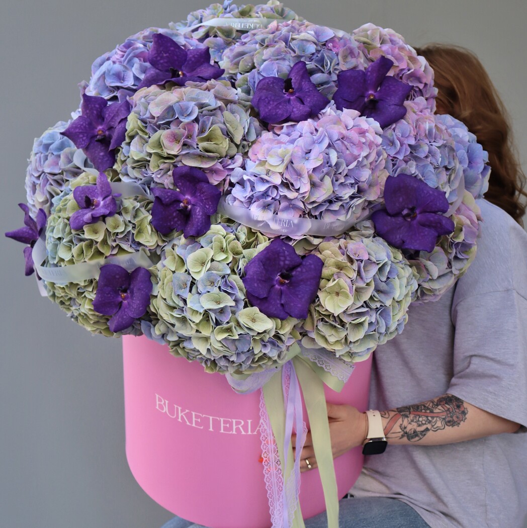 Lilac hydrangeas with purple vanda orchids