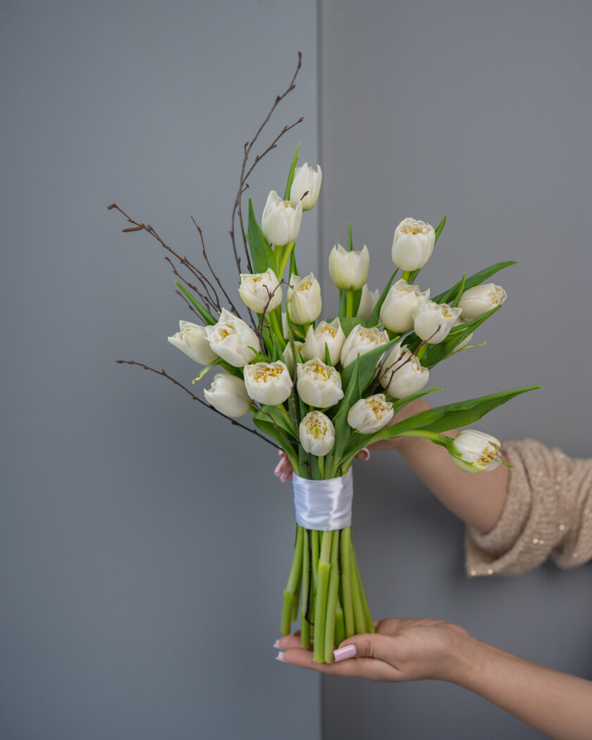 Twenty-five white tulips with silver dollar eucalyptus