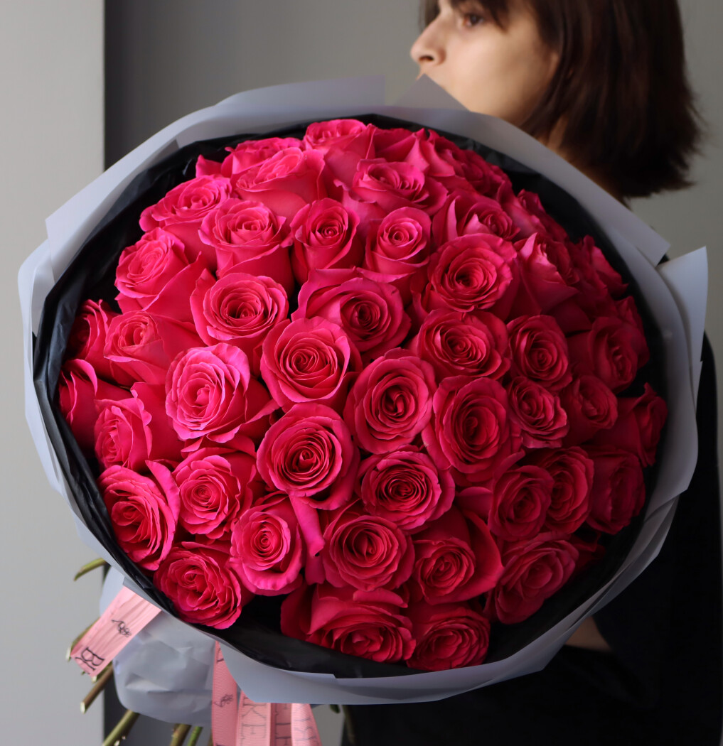 Mono bouquet of hot pink garden roses