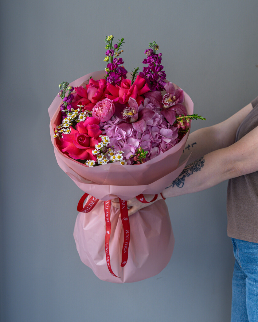 Mixed bouquet of hot pink garden roses and light pink hydrangea