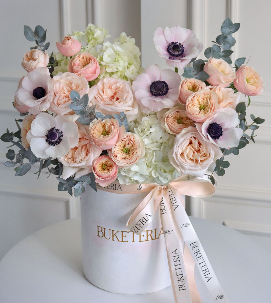 Peach spray roses with white hydrangeas and anemones