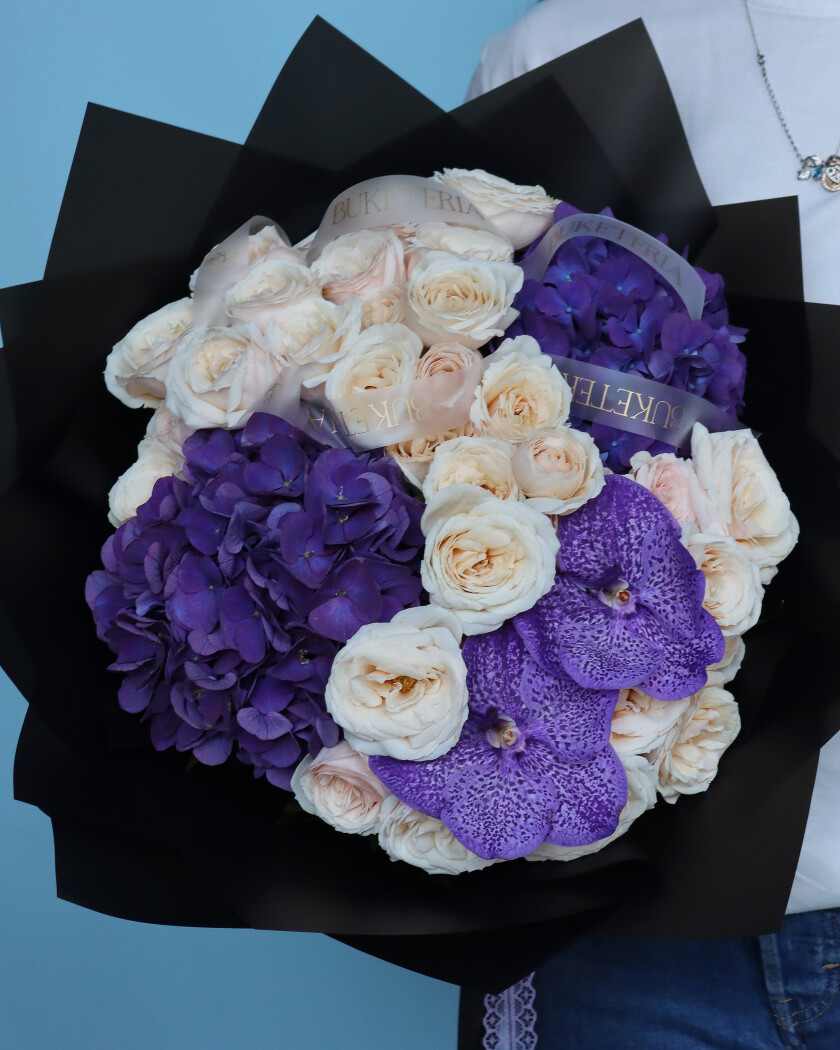 Elegant bouquet of cream spray roses, purple vanda orchids, and light blue hydrangeas