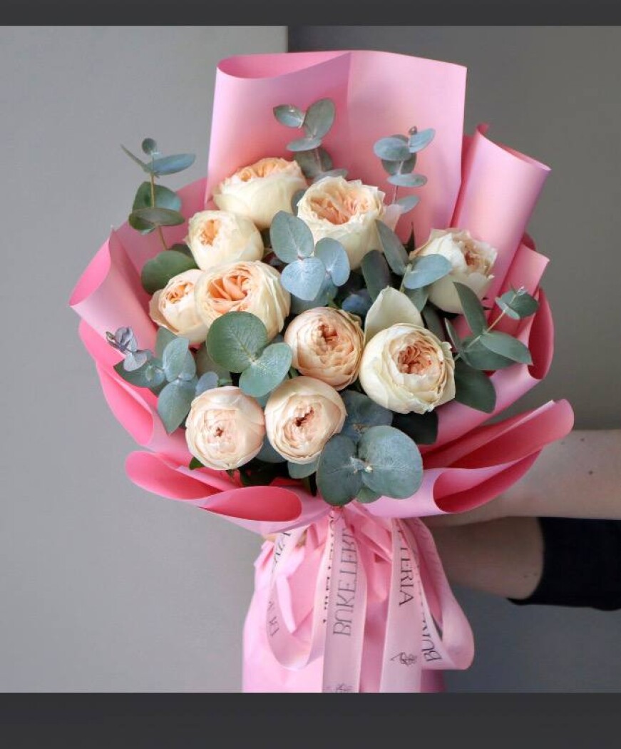 Peach spray roses in waterproof paper