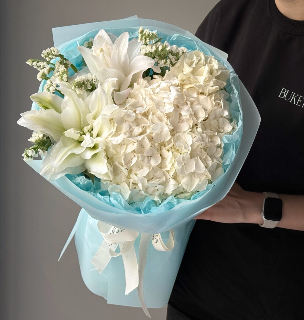 White hydrangea with white roses and oriental lily