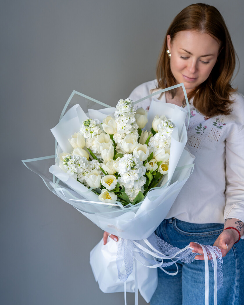 Elegant bouquet of white tulips and stock