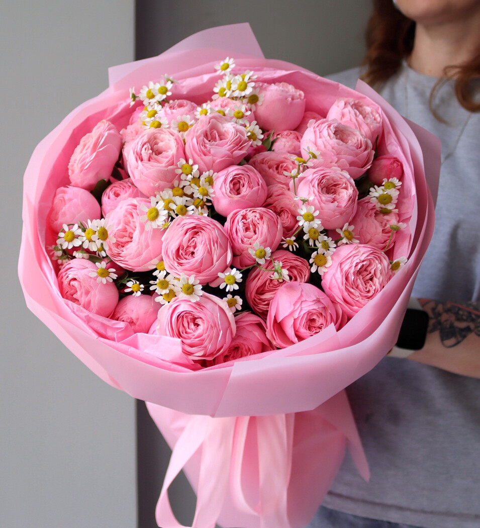 Seven light pink garden roses in waterproof paper