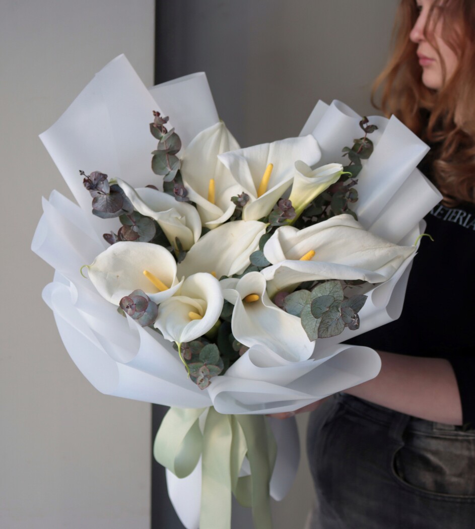Nine white callas in waterproof paper