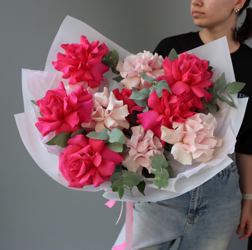 Six hot pink and five light pink garden roses