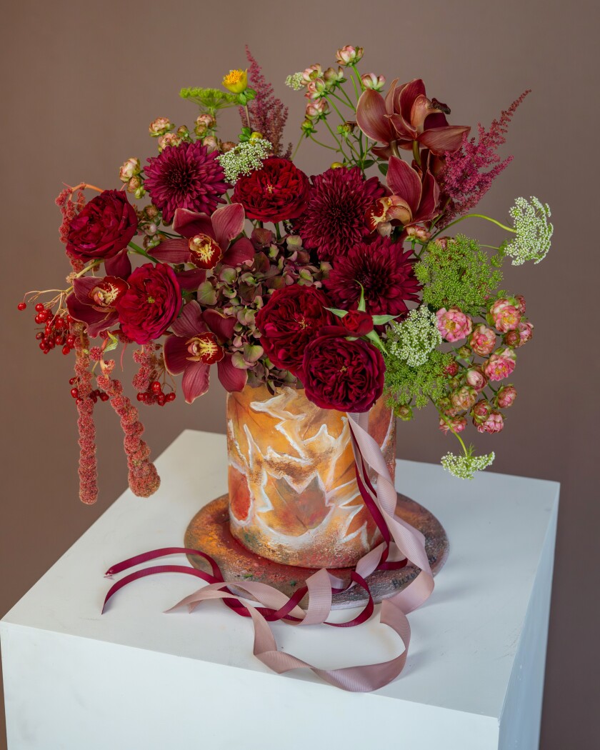 Burgundy hydrangea with red cymbidium orchids