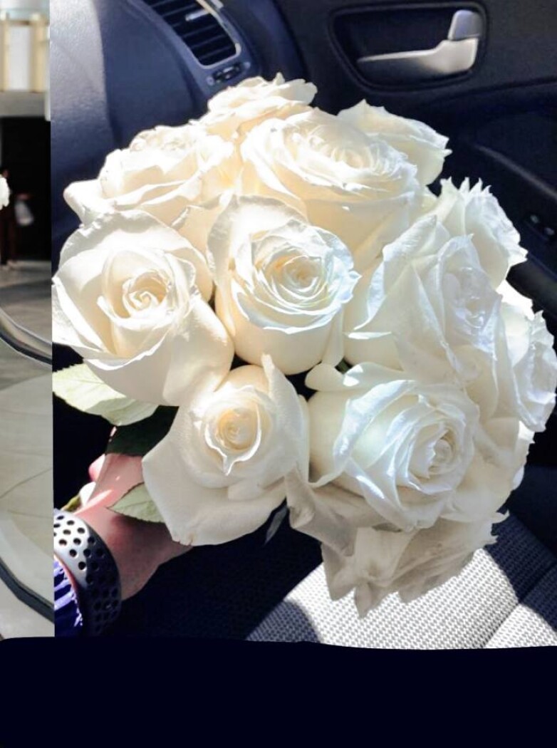 Fifteen white hybrid tea roses