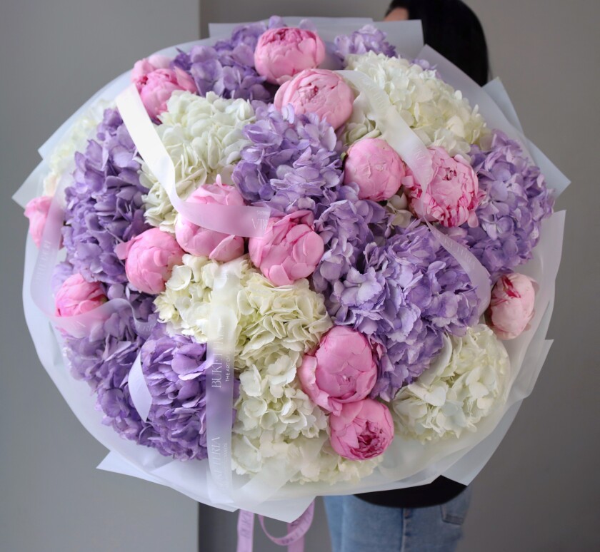 Mixed bouquet of white hydrangeas and pink peonies