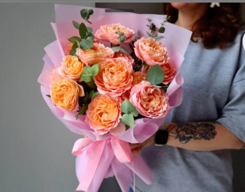 Peach spray roses in waterproof paper