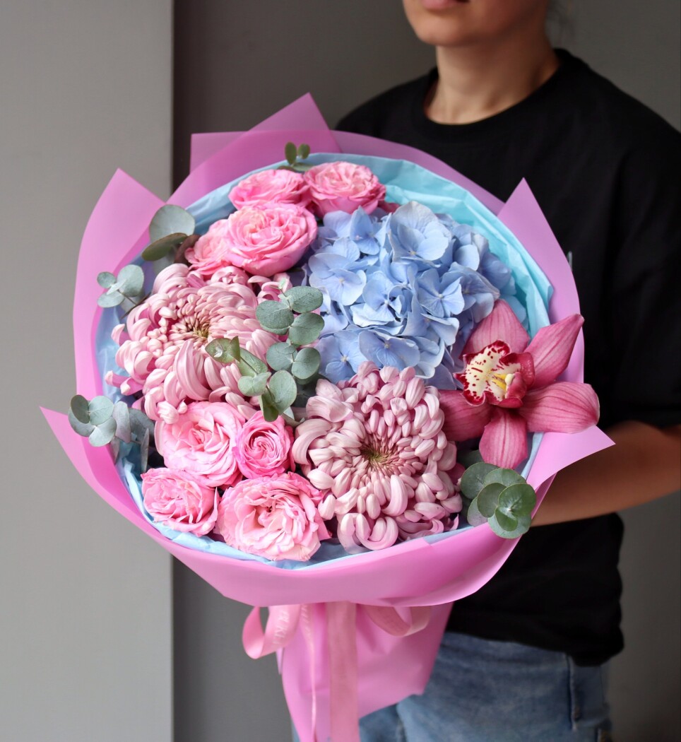 Three blush spray roses with dusty pink chrysanthemums and blue hydrangea