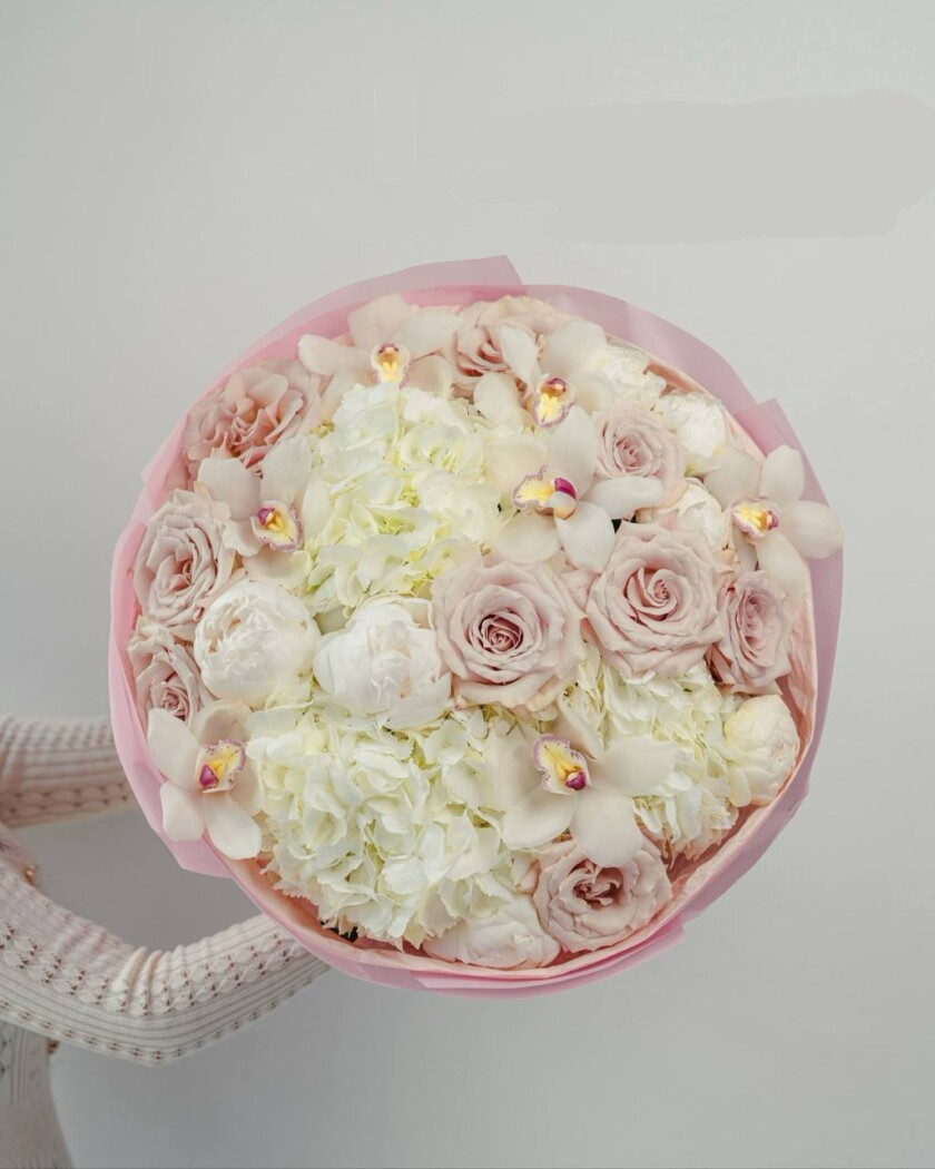 Blush peonies with dusty pink garden roses and white hydrangeas