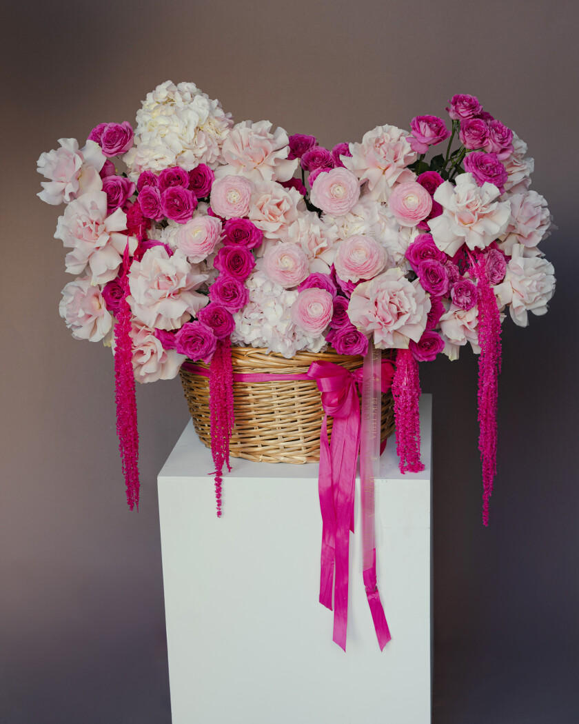 Twelve pink spray roses with light pink garden roses