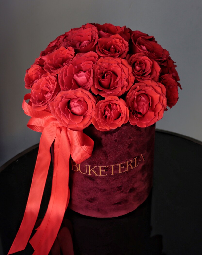 Twenty-one red hybrid tea roses in a luxury box