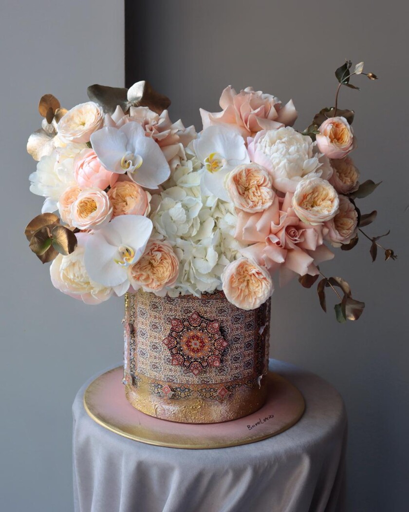 Floral composition in an art box with Khonchali buta carpet ornament