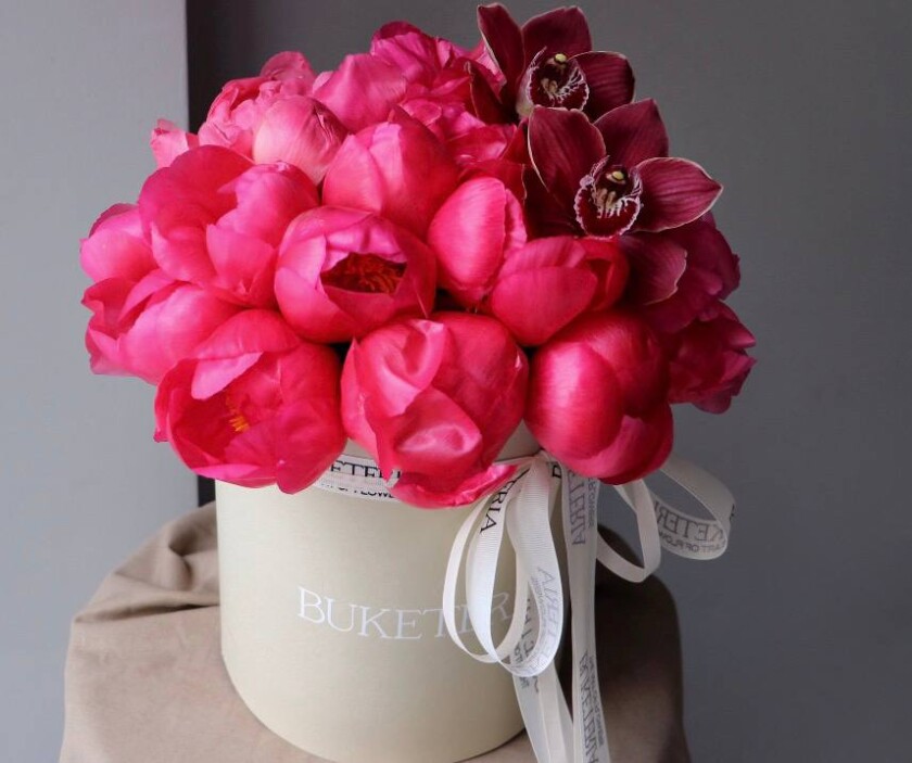Hot pink peonies with burgundy cymbidium orchids