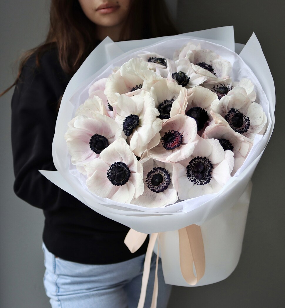 Twenty-one white anemones in waterproof paper