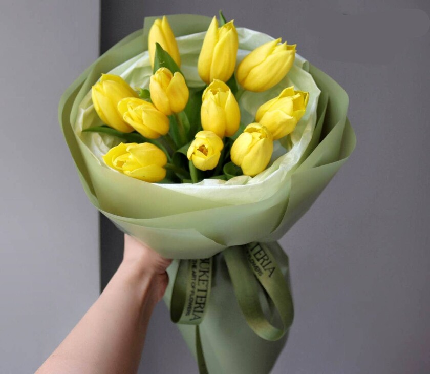 Eleven yellow tulips in waterproof paper