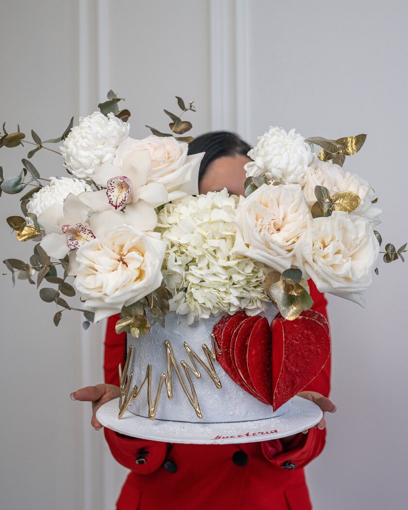 Decorative composition of blush garden roses with white hydrangeas