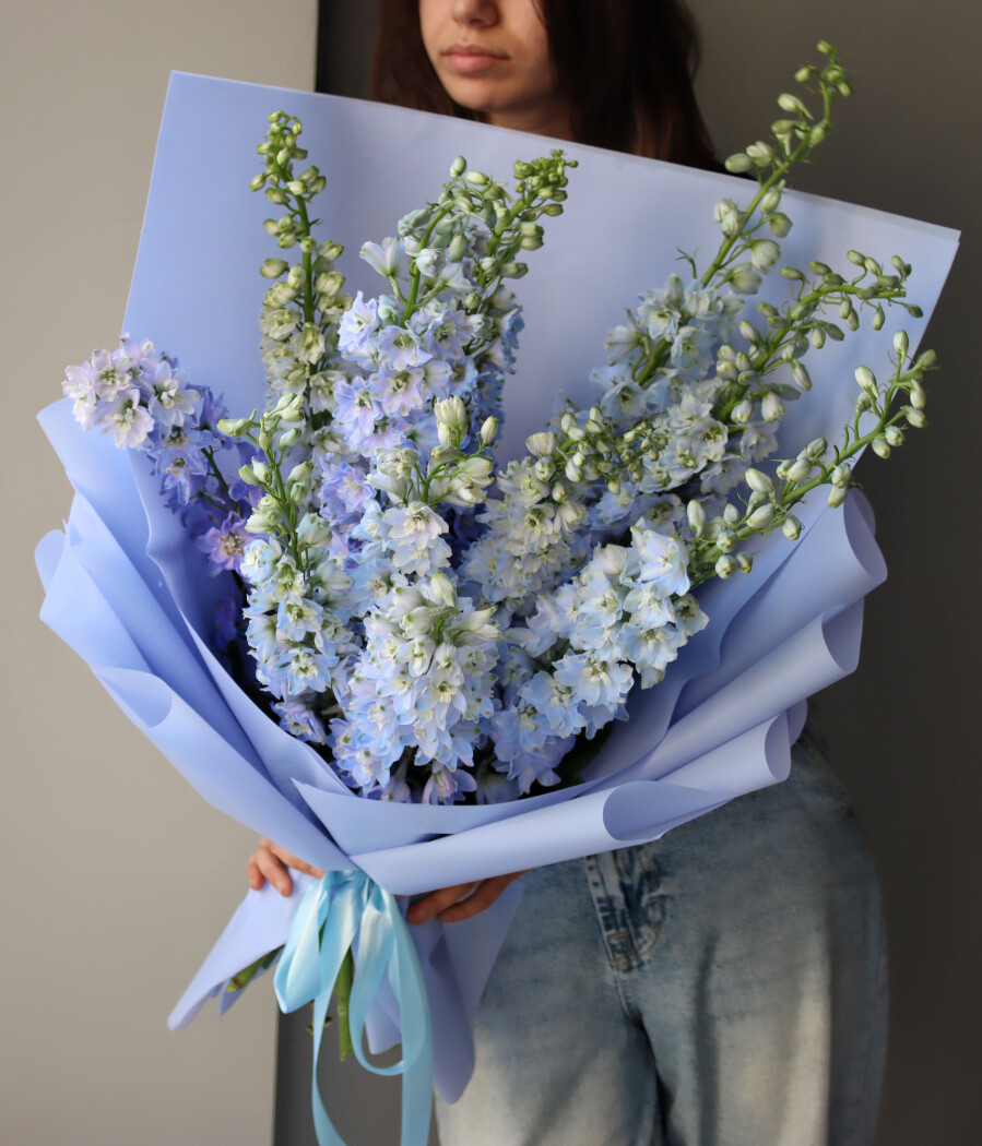 Mono bouquet of eleven light blue delphiniums