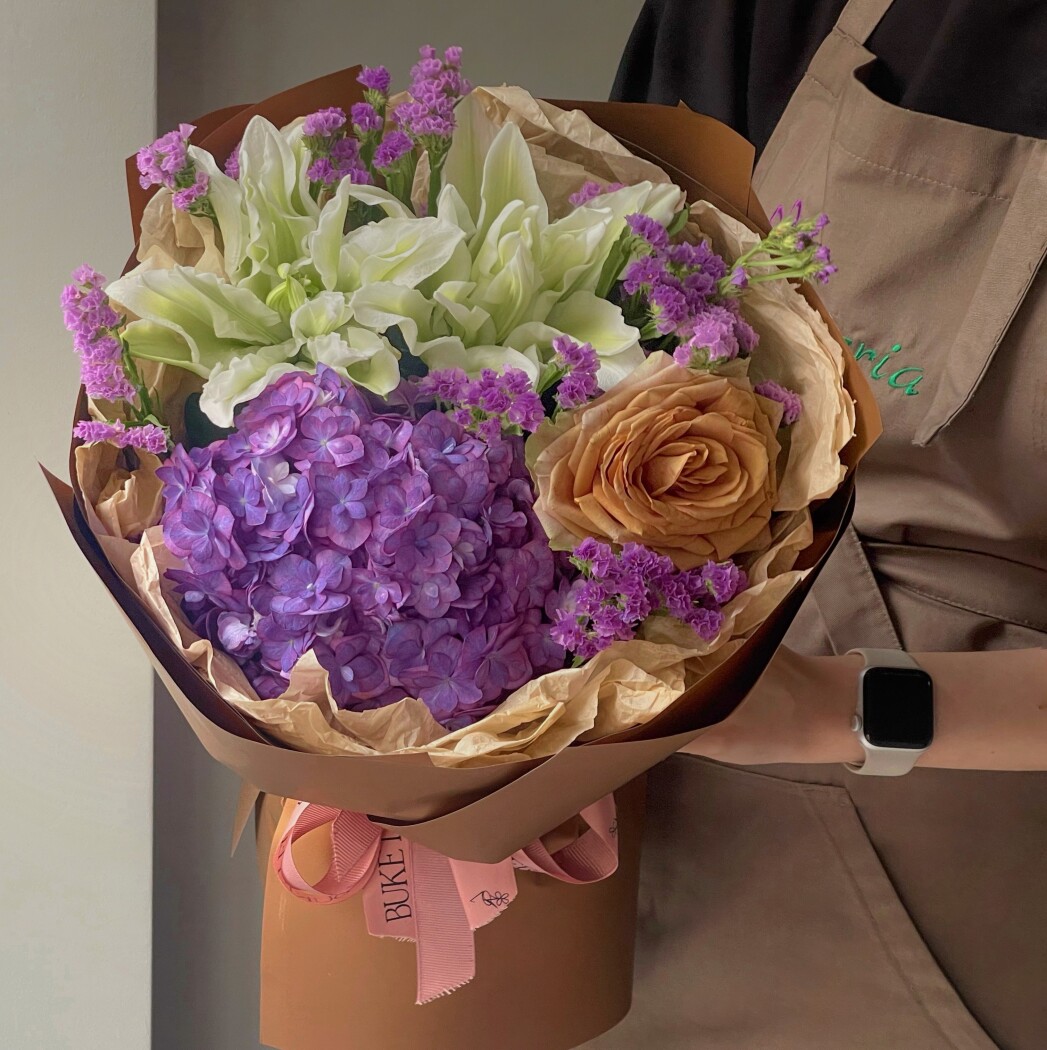 Lilac hydrangea with apricot garden rose and white oriental lily