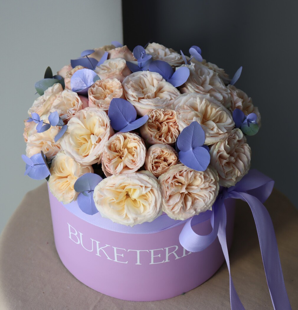 Peach spray roses in a decorative arrangement