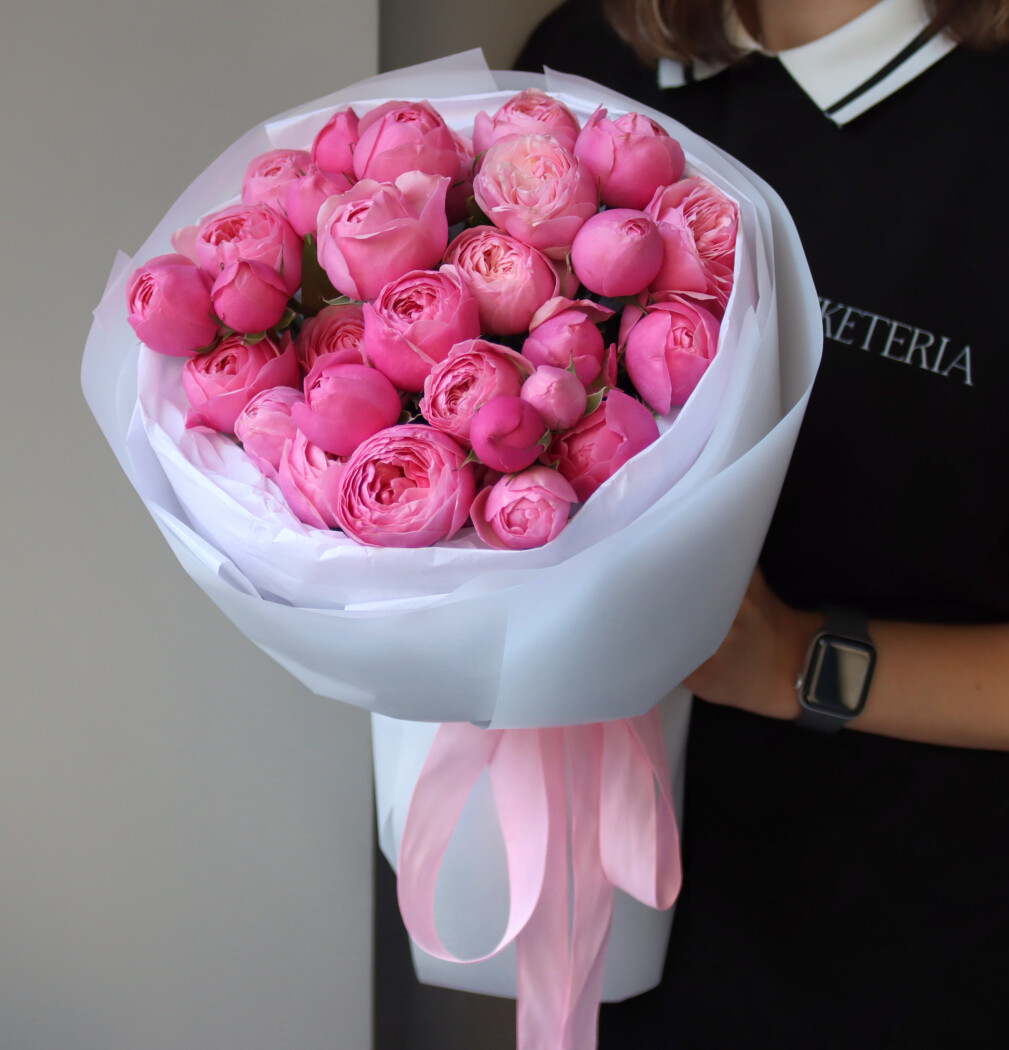 Five light pink spray roses in waterproof paper