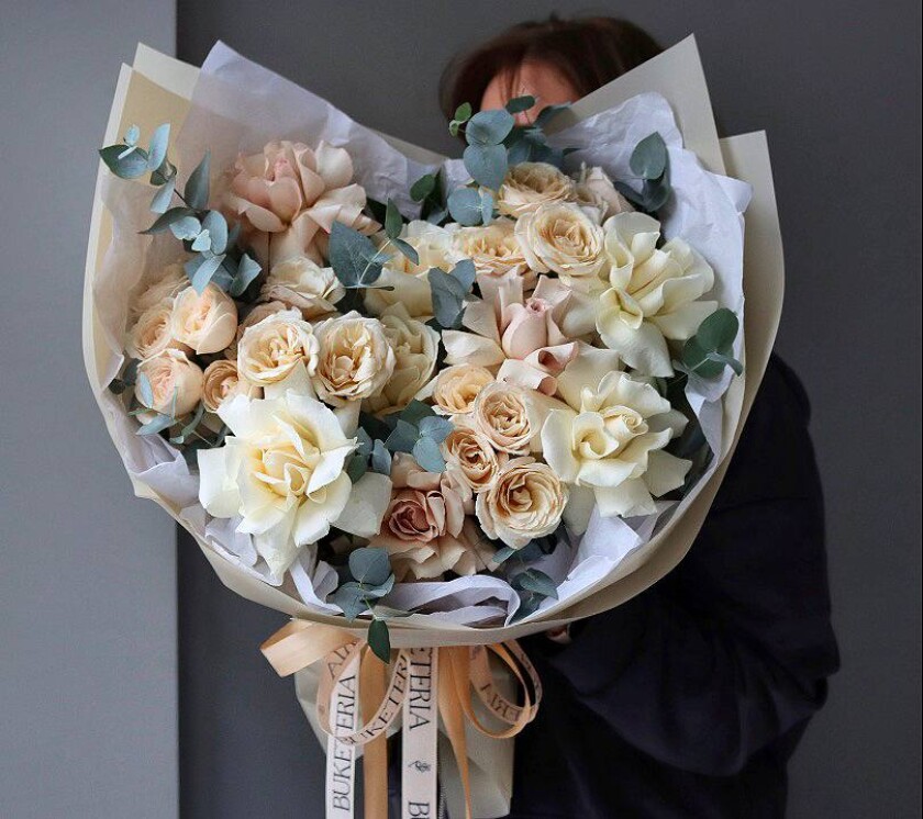 Peach garden roses and dusty pink spray roses