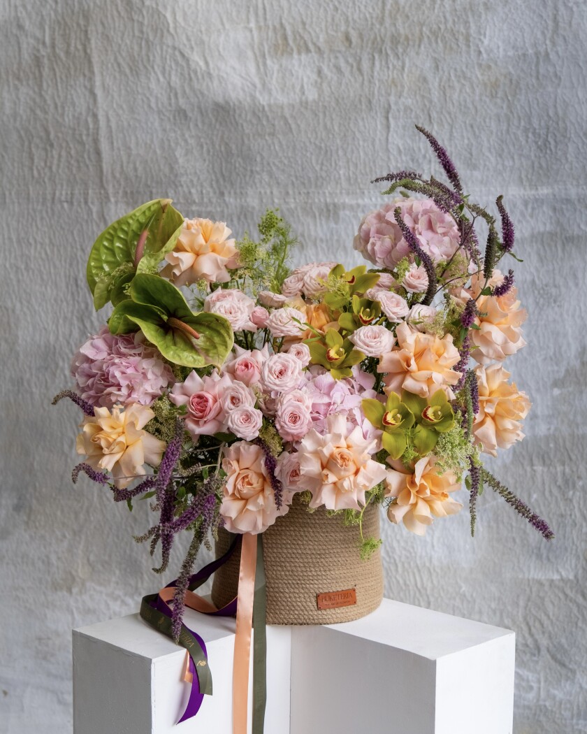 Fourteen peach garden roses with pink hydrangeas and blush spray roses