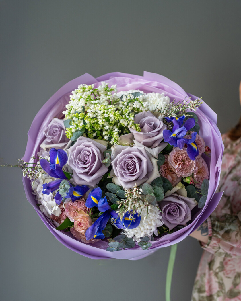 Five mauve garden roses with dusty pink spray roses and lilac hydrangea